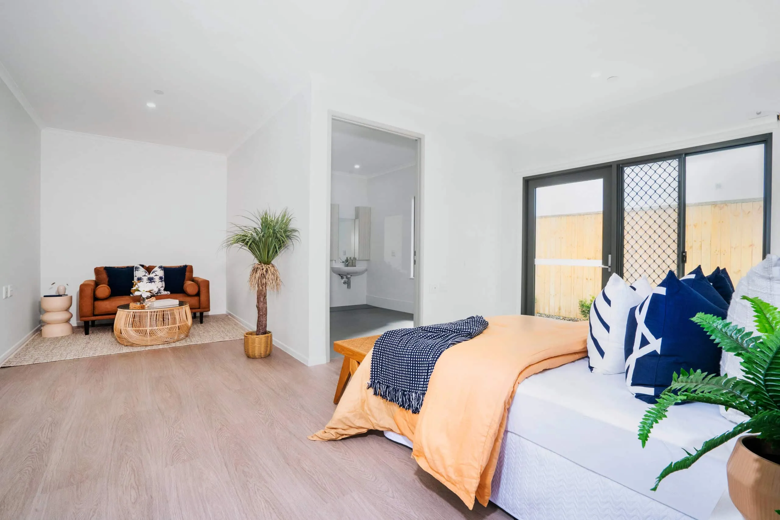 A bedroom with a sofa