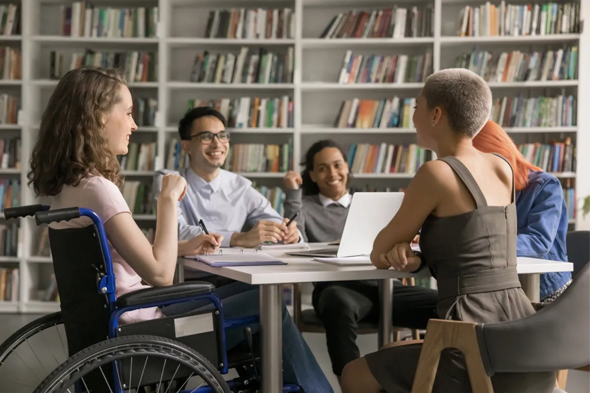 A group of friends in a library