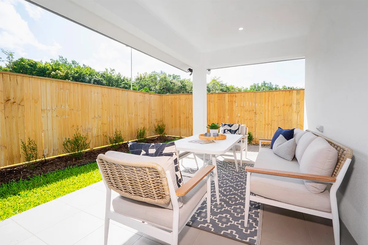 A deck with an outdoor setting