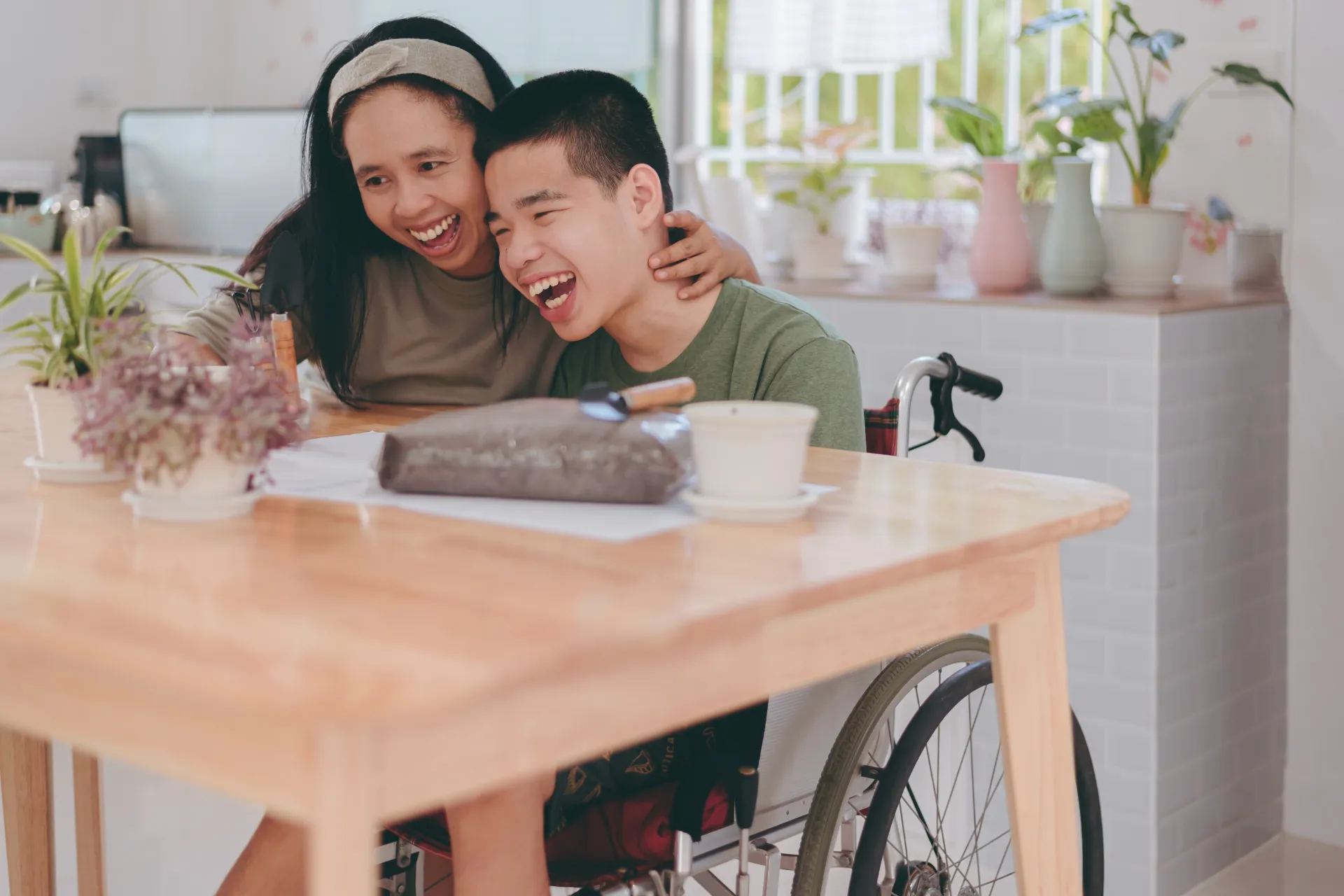 Young person in wheelchair smiling