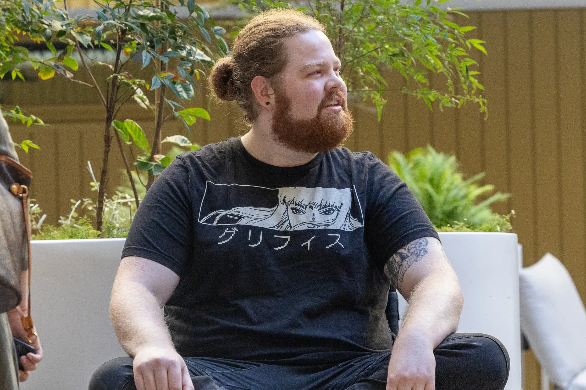 Smiling person in wheelchair